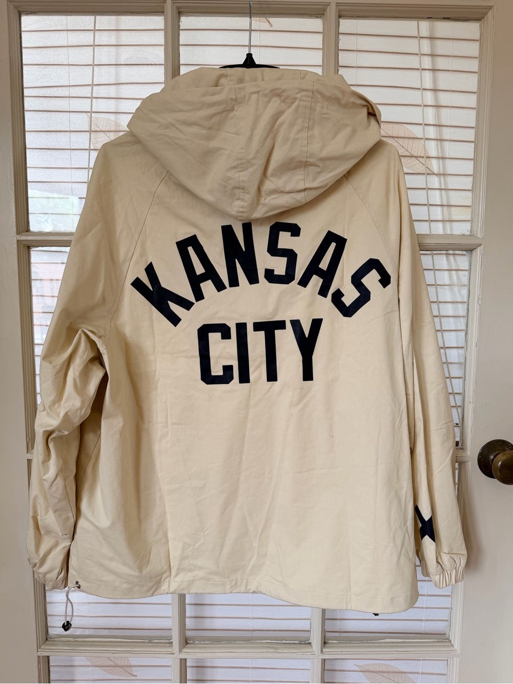 Kansas City Hooded Windbreaker Jacket - Cream with Black Lettering